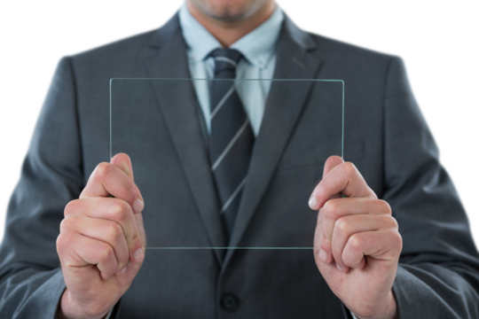 Midsection of businessman holding futuristic digital tablet