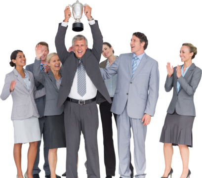Excited business team cheering at camera with trophy