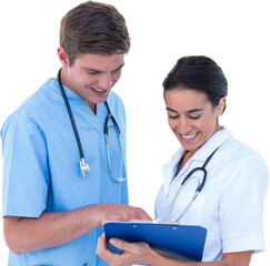 Smiling doctors looking at writing writing pad 