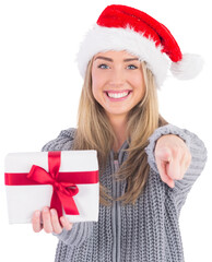 Festive blonde holding christmas gift