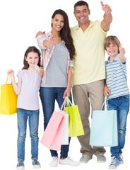 Family with shopping bags gesturing thumbs up