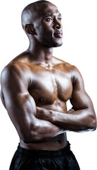 Fototapeta na wymiar Shirtless athlete standing with arms crossed while looking away