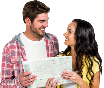Smiling couple looking at each other while holding map