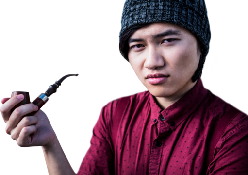 Thoughtful hipster smoking pipe