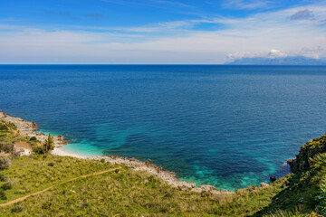 Fototapeta na wymiar View of the beautiful blue sea falling between the mountain shores.
