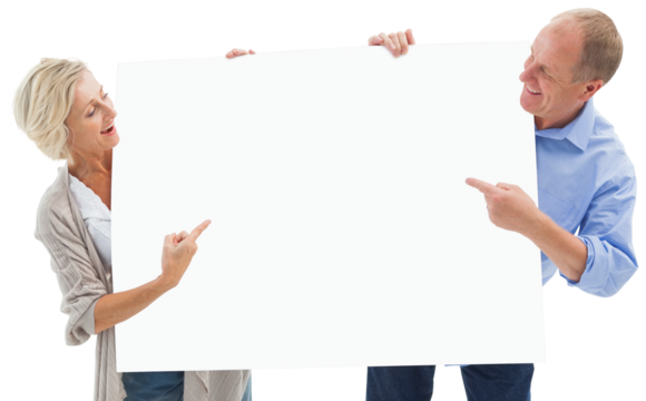 Mature couple smiling and holding card - Powered by Adobe