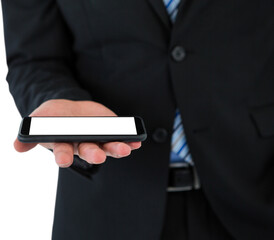 Midsection of businessman holding mobile phone