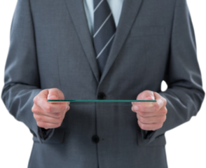Midsection of businessman using futuristic digital tablet