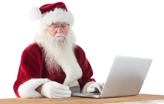 Santa pays with credit card on a laptop