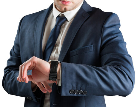 Businessman checking the time on watch