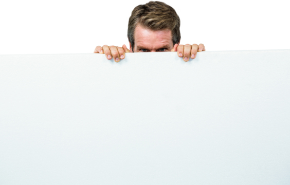 Man hiding behind board