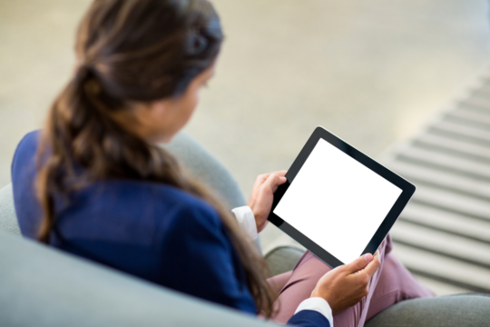 Woman using digital tablet