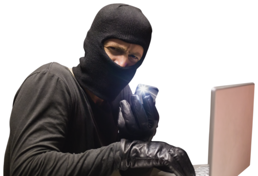 Hacker using laptop to steal identity