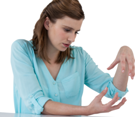 Businesswoman sitting at desk and gesturing