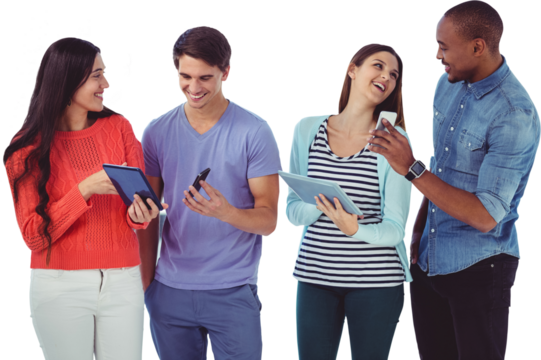 Young creative team looking at phones and tablets