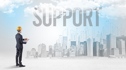 Young businessman with hard hat