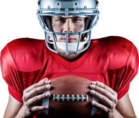 Close-up portrait of confident American football player holding ball