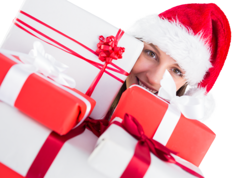 Close up of a festive young woman holding many gifts