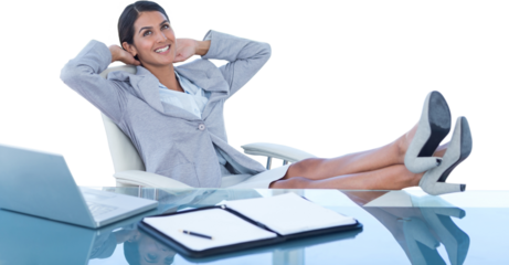 Businesswoman relaxing in a swivel chair