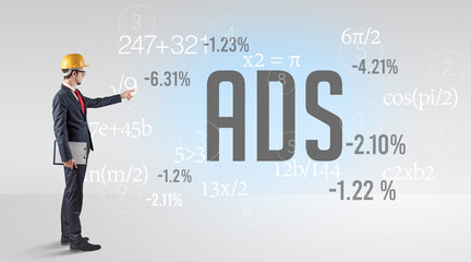 Engineer in hard hat with abbreviation