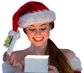 Sexy girl in santa costume opening a gift