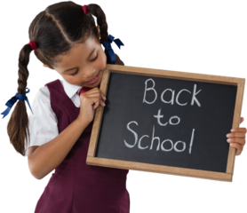 Schoolgirl holding writing slate with text