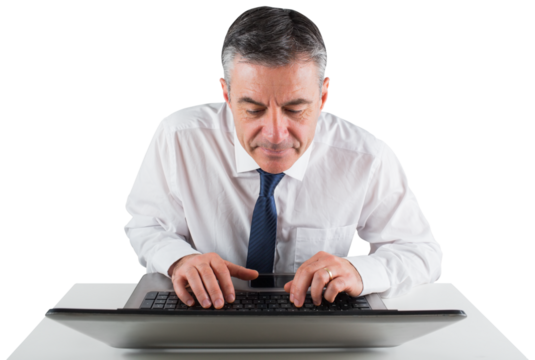 Mature businessman using his laptop