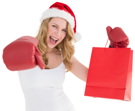 Festive blonde with boxing gloves and shopping bag