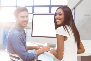 Portrait of Businesswoman and coworker in office