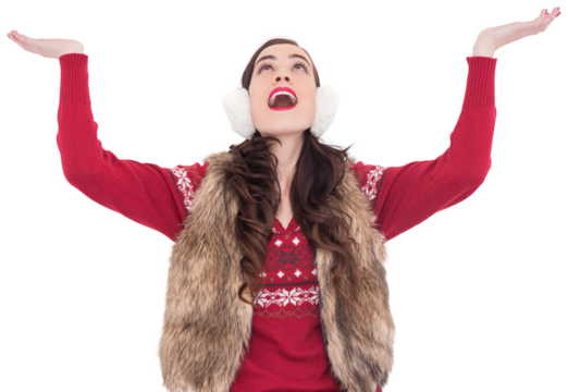 Brunette in winter clothes with hands out