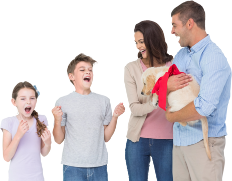 Parents gifting puppy to children
