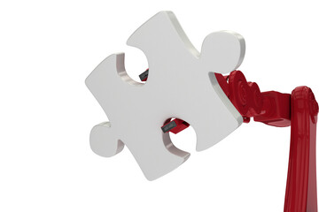 Close-up of metal claw holding puzzle piece
