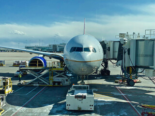 commercial airplane at the airport gate