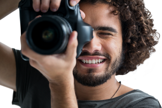 Close up of happy man photographing with camera