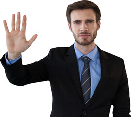 Businessman in suit touching invisible interface