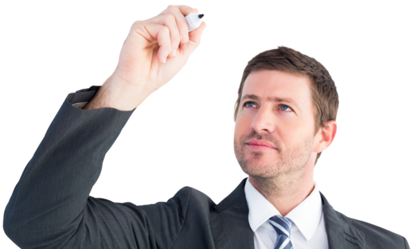 Serious businessman writing with marker