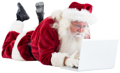 Santa lies in front of his laptop