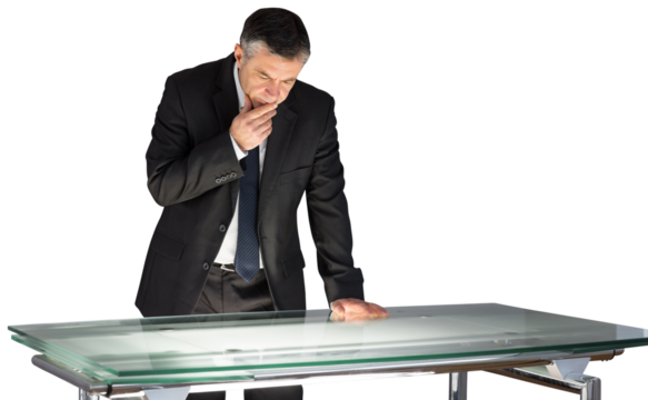 Mature businessman using interactive desk - Powered by Adobe