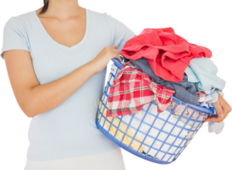 Brunette holding a basket full of laundry