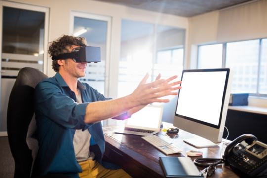 Businessman wearing virtual glasses