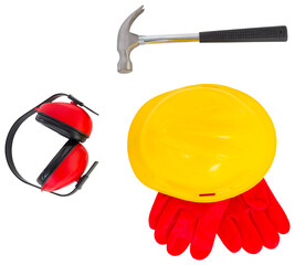 Hardhat with gloves, earmuffs and hammer on white