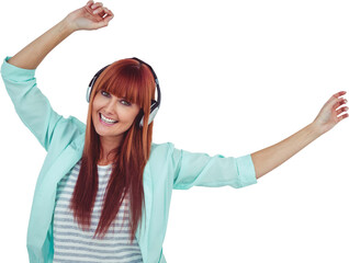 Happy hipster woman listening music with headphone