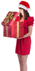 Surprised festive brunette holding a gift
