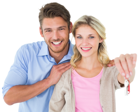 Attractive young couple showing new house key