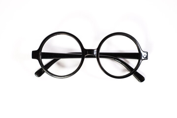 Obraz premium Round black eyeglasses isolated on white background. Harry Potter style circle glasses. 
