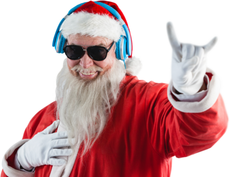 Santa claus showing horn sign while listening to music on headphones