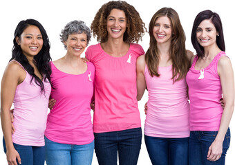 Portrait of happy females in pink outfits with arm around posing for breast cancer awareness