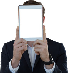 Businessman hiding his face with digital tablet