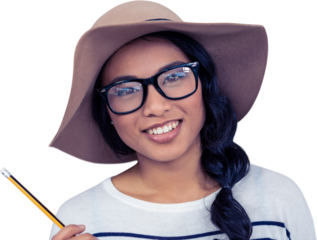 Smiling Asian woman with hat holding pencil