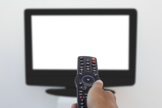Hand holding remote and changing channel